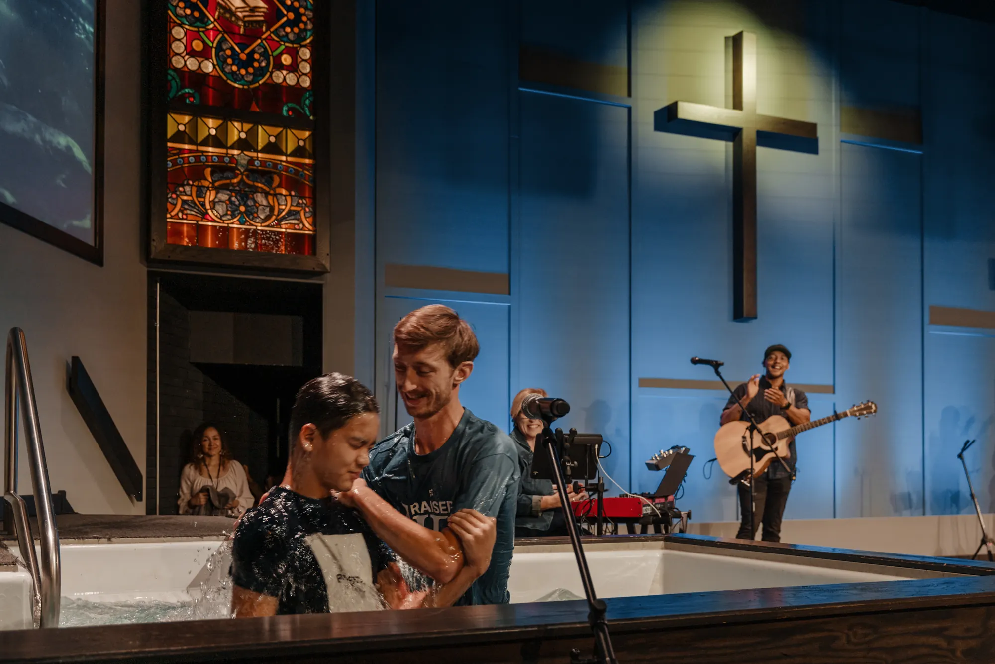 Musicians perform during an El Faro benefit program.