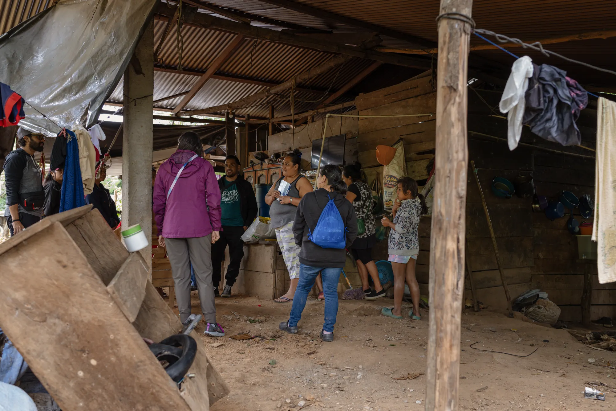 El Faro partners deliver practical support inside a rural home.