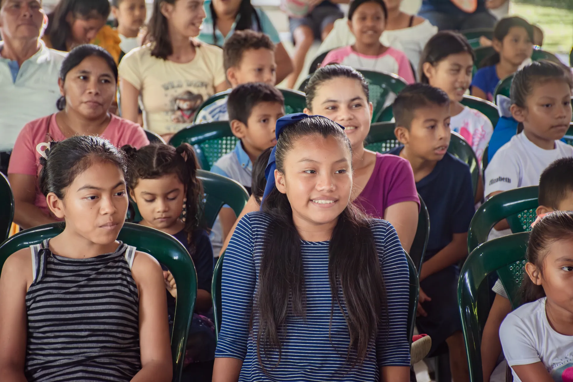 Children and families gather for an El Faro youth program in Guatemala.