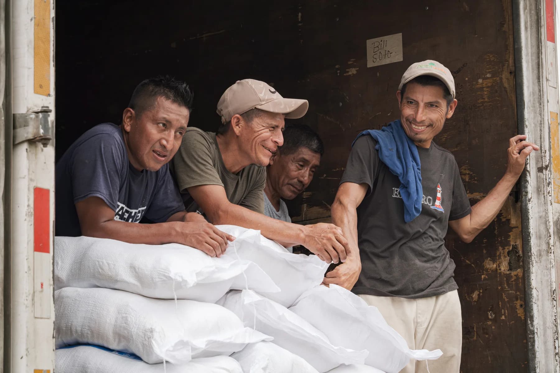 Volunteers prepare food bags in San Pedro.